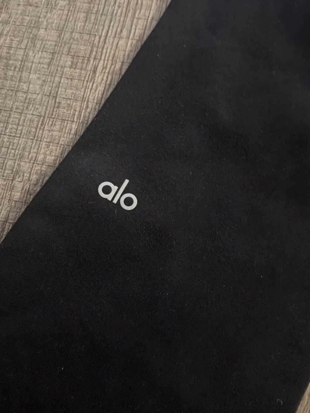 ALO Yoga Black Leggings with Subtle Light Logo